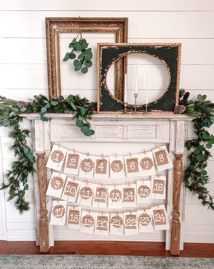 Faux mantel with bags hanging for advent calendar on bottom.