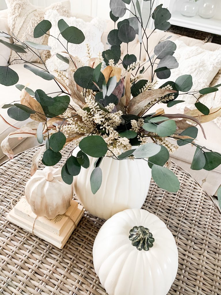 fall foliage in a craft pumpkin