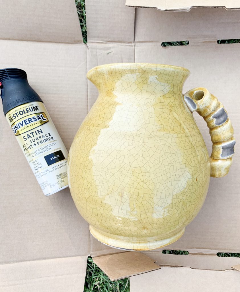 yellow pot and black spray paint