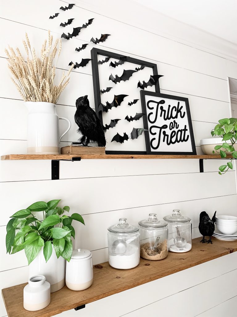 side view of Halloween signs and crow decor