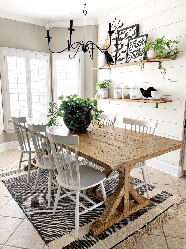 kitchen table in eating area with plant centerpiece 